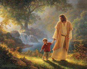 Jesús con un niño paseando por campo